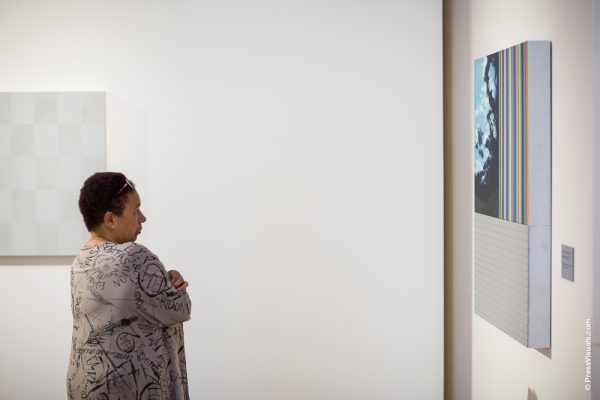 Woman viewing artwork